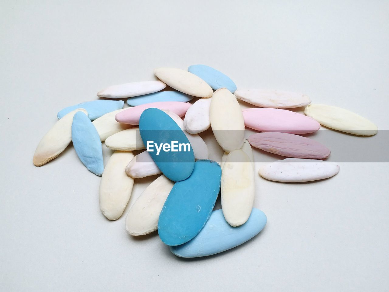 Close-up of soaps on white background