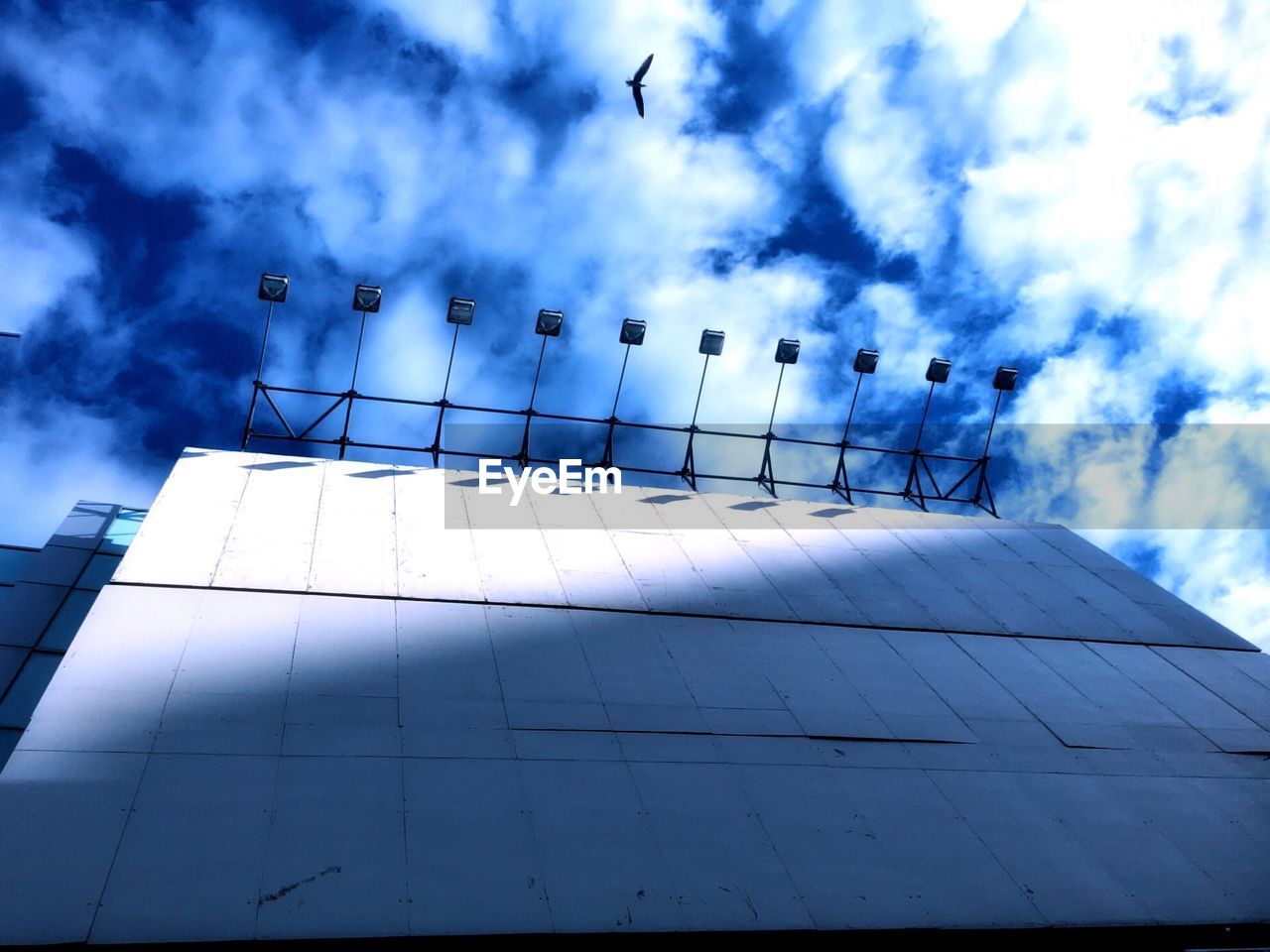 Low angle view of blank billboard