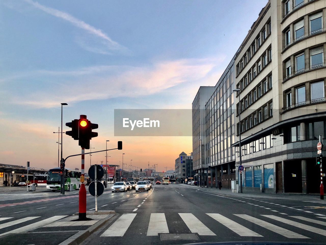 Road in city at sunset