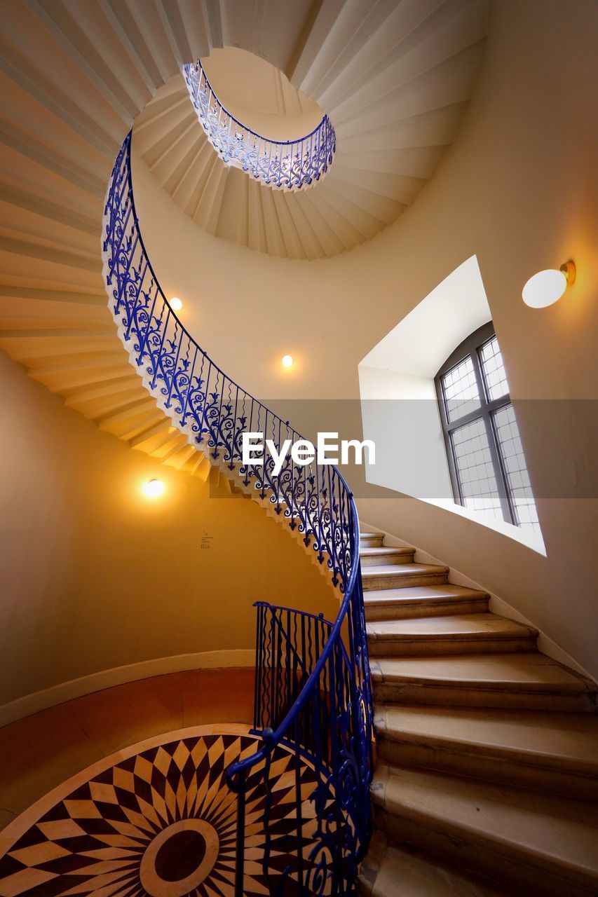 CLOSE-UP OF SPIRAL STAIRS