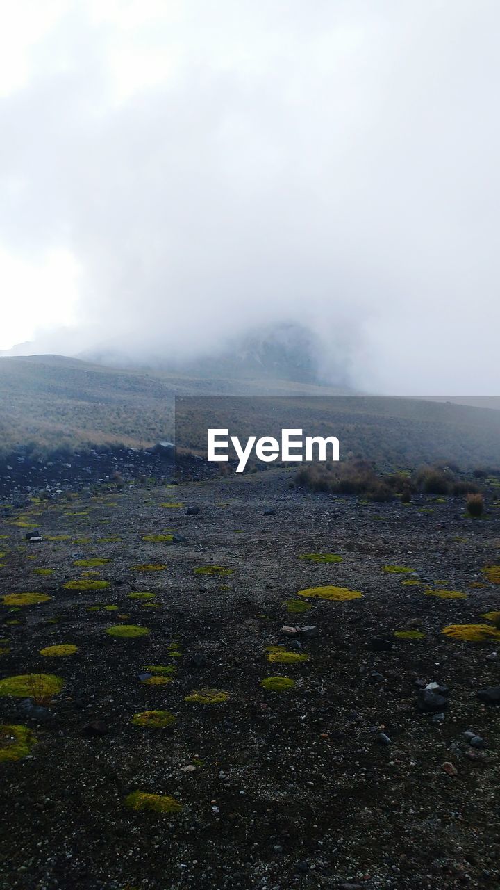 Scenic view of nevado de toluca against sky in foggy weather