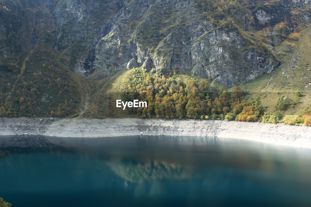 Scenic view of lac d oo against mountain