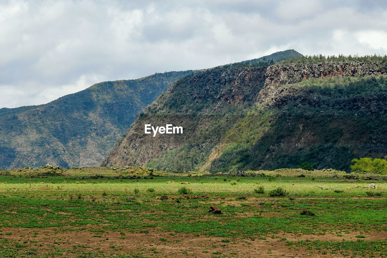 Scenic mountain against a cloudy sky, mount suswa, rift valley, kenya