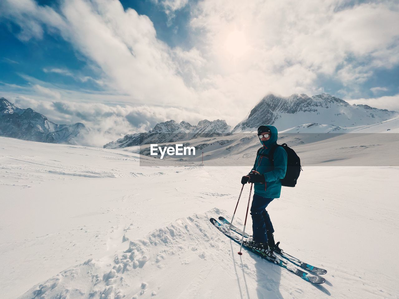 Man skiing on snowcapped mountain