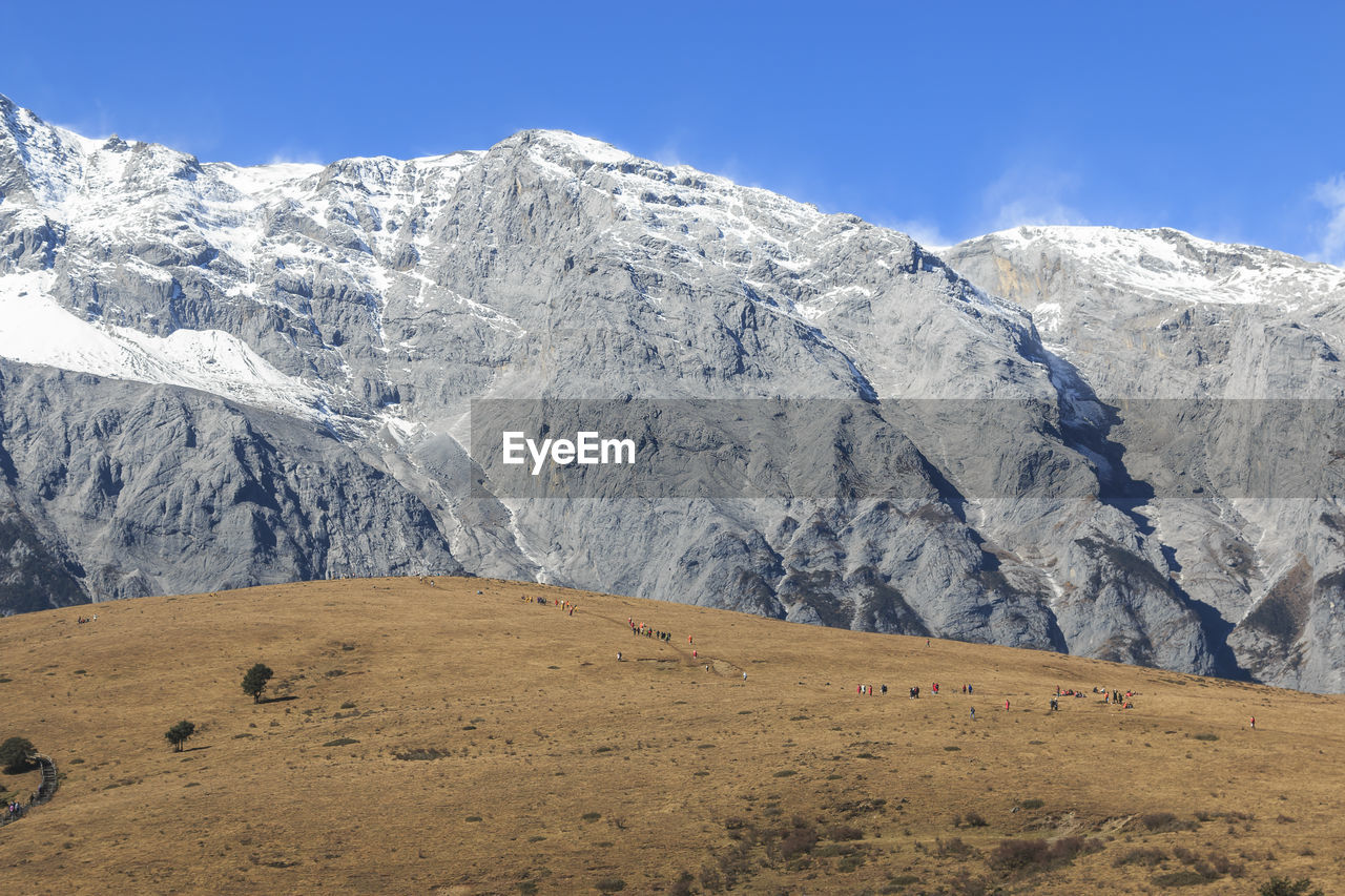 Scenic view of jade dragon snow mountain against sky