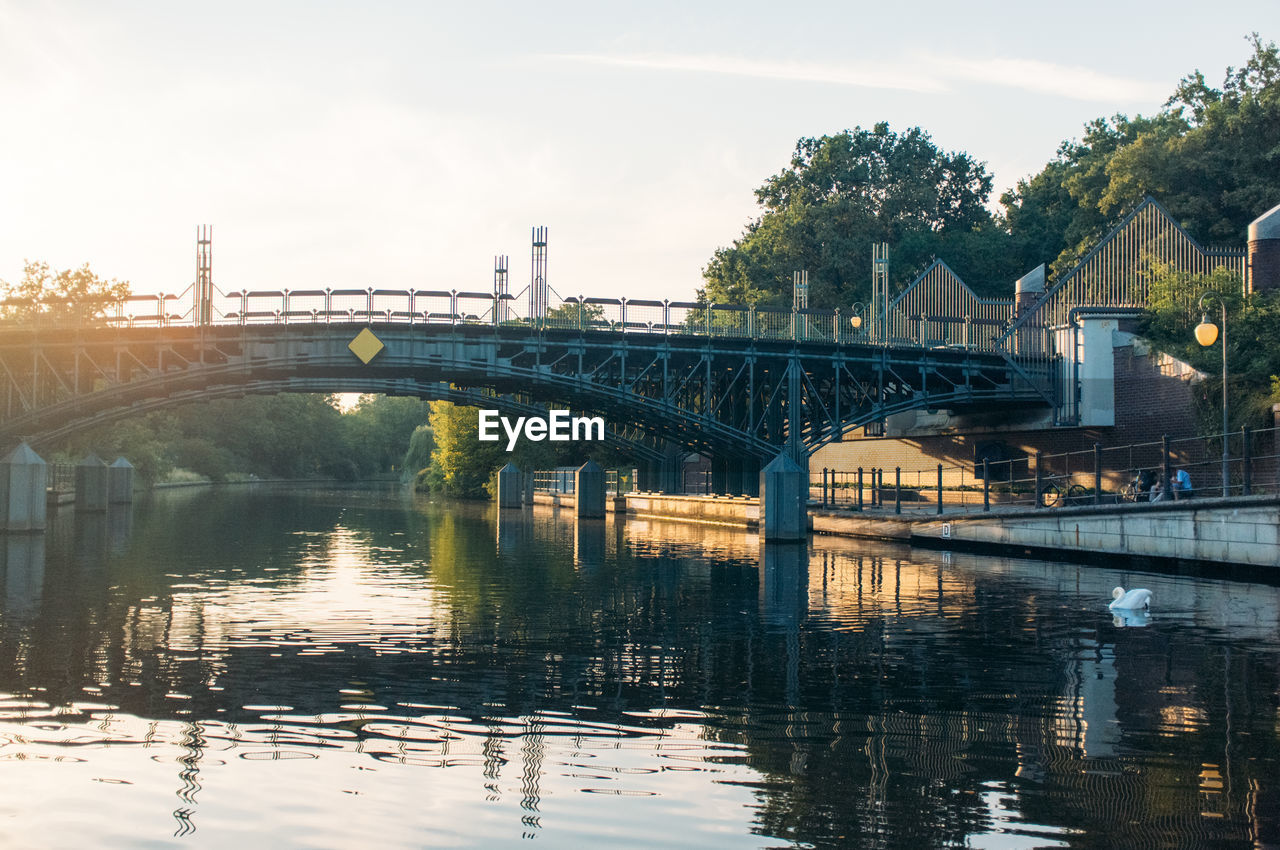 Bridge over river against sky