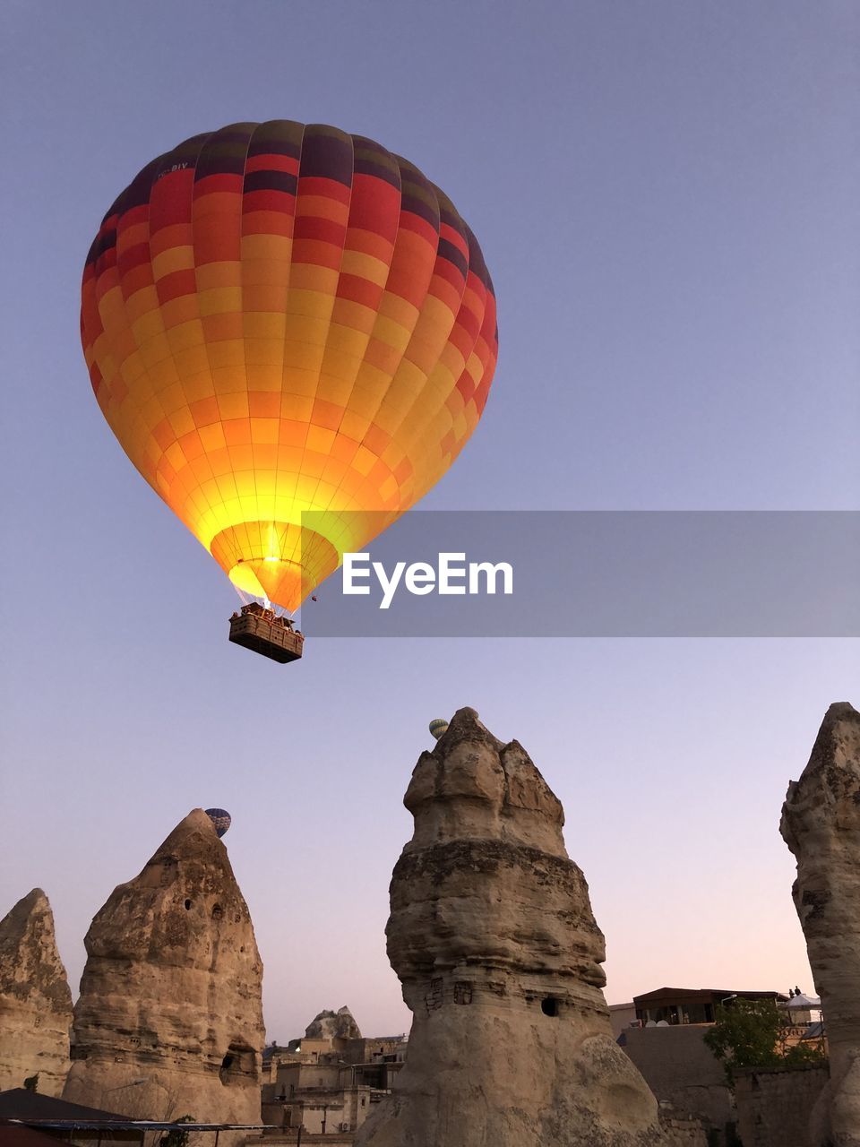 Low angle view of hot air balloons against sky