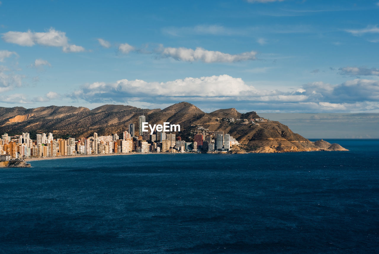 Panoramic view of sea against cloudy sky