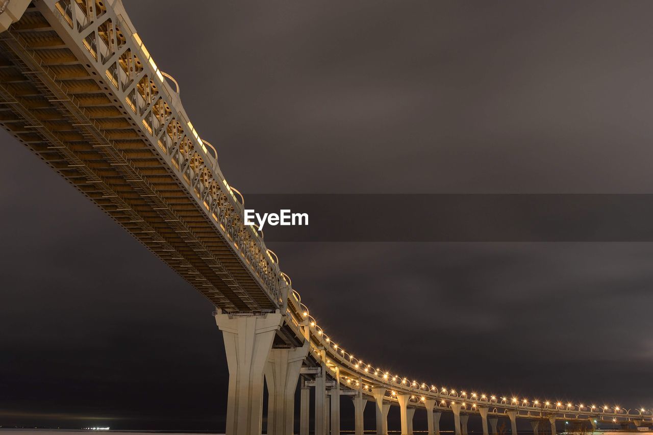 Low angle view of illuminated bridge