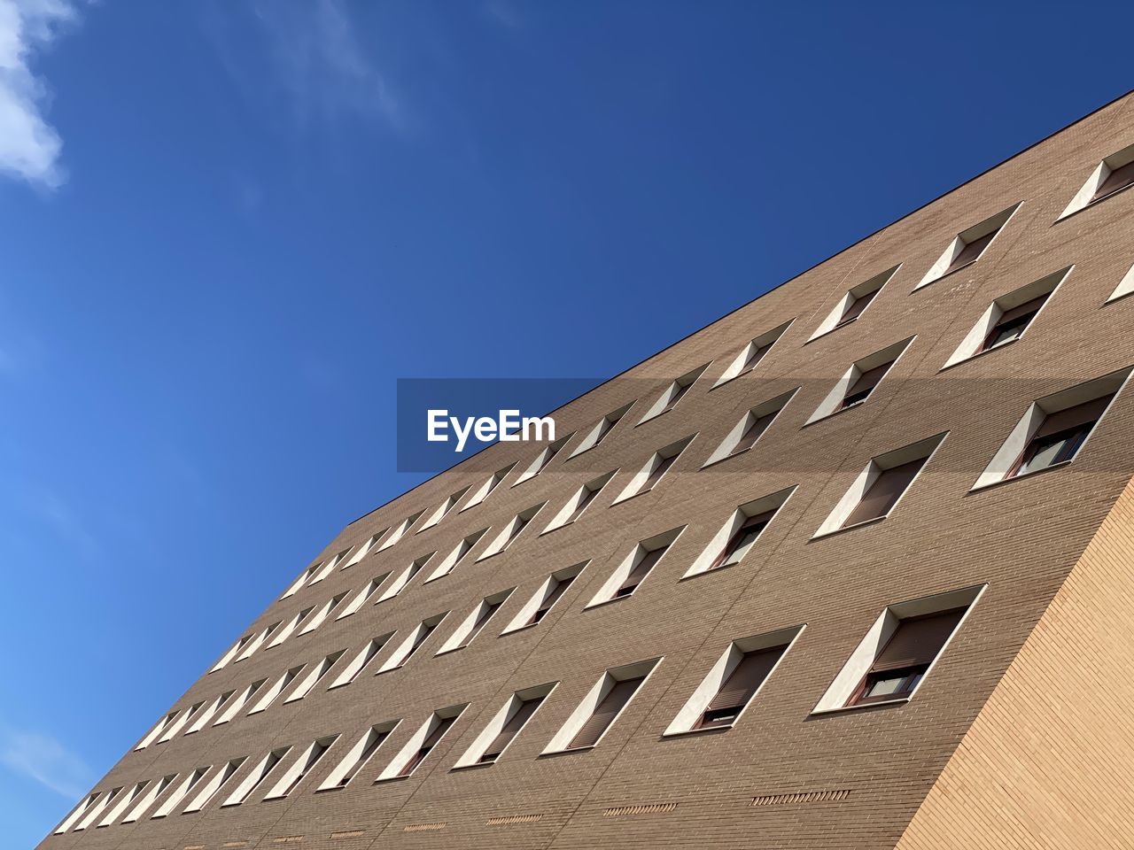 Low angle view of modern building against sky