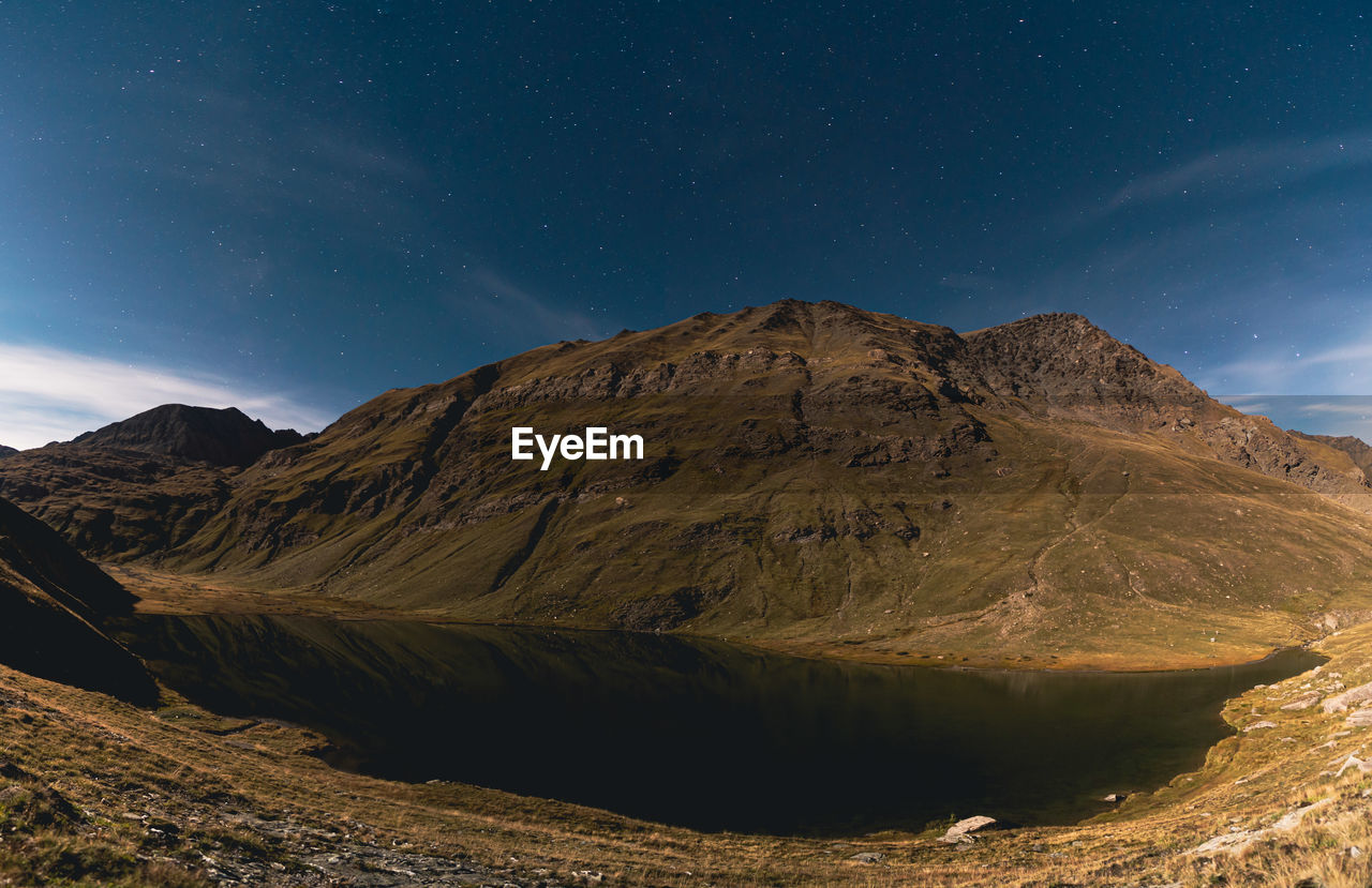 Alpine lake at night