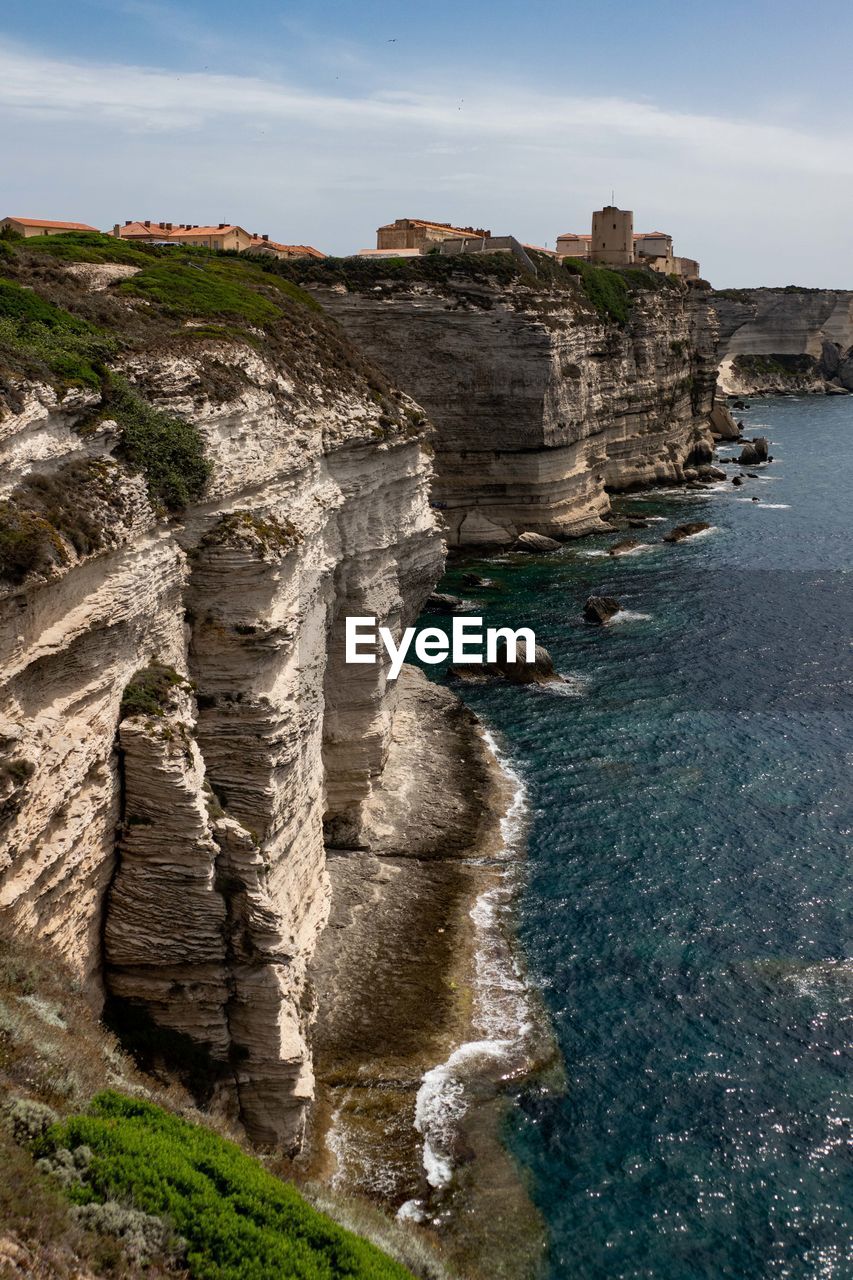 VIEW OF ROCK FORMATIONS ON COAST