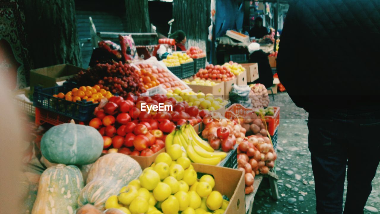 Various fruits for sale at market stall