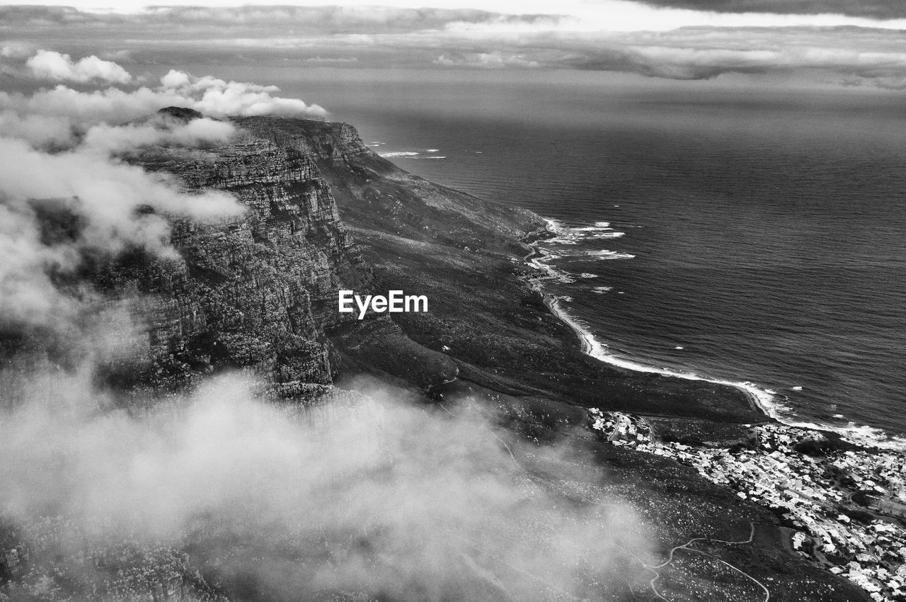 Aerial view of coastline against sea