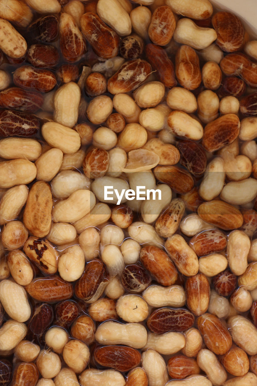 Full frame shot of peanuts in water