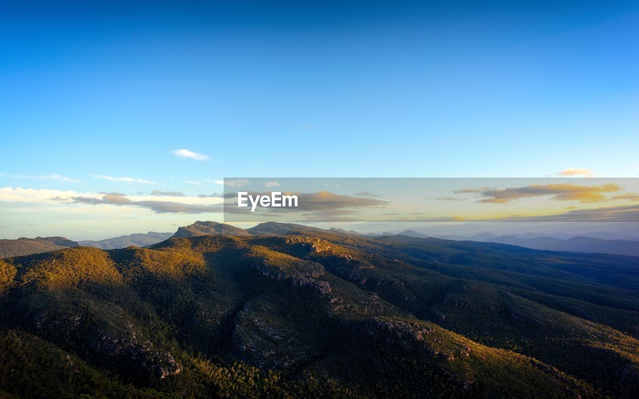 Scenic view of landscape against sky during sunset