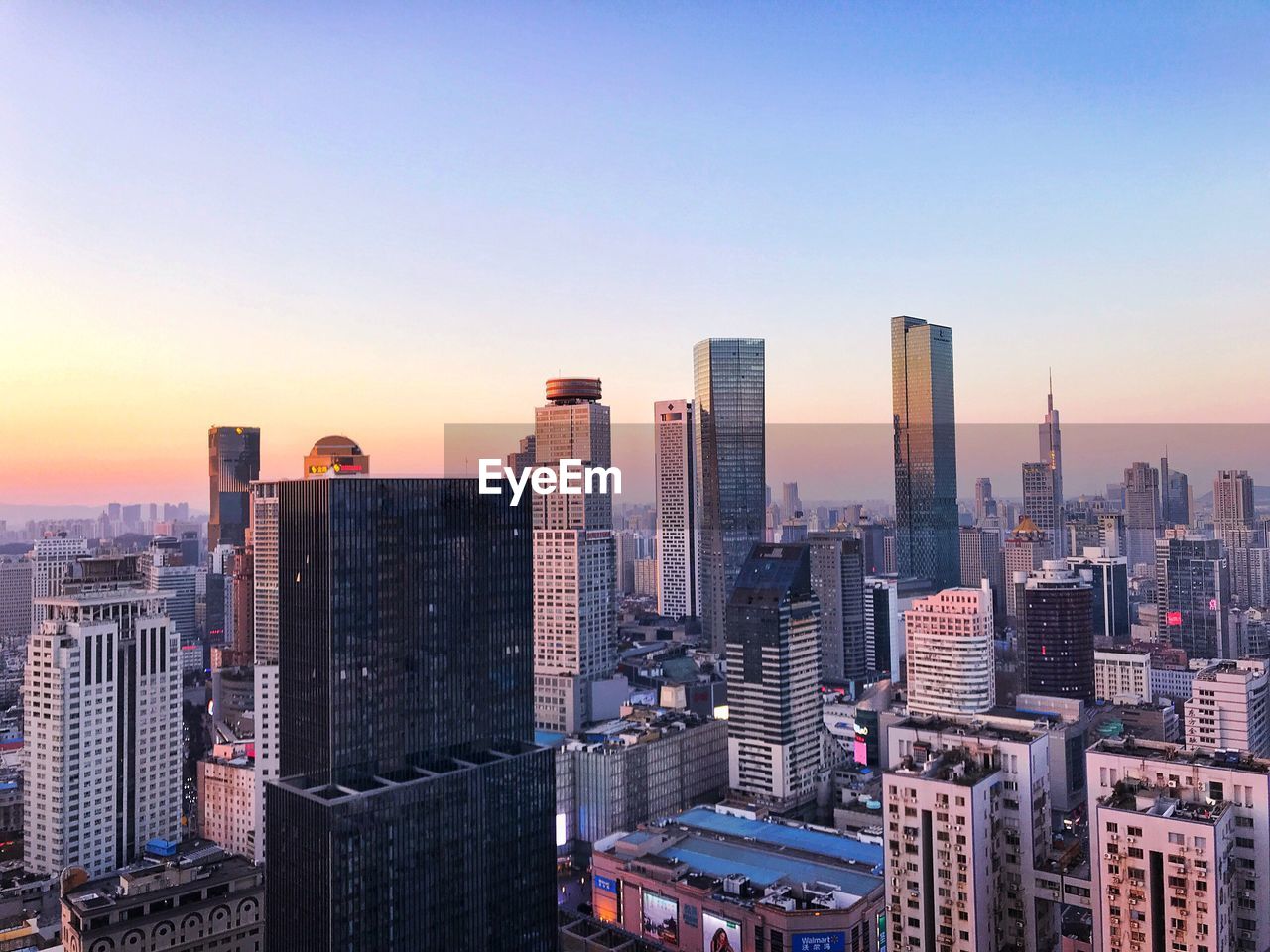 Aerial view of city at sunset