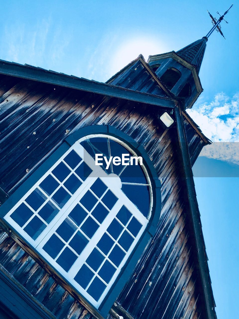 Low angle view of clock tower against sky