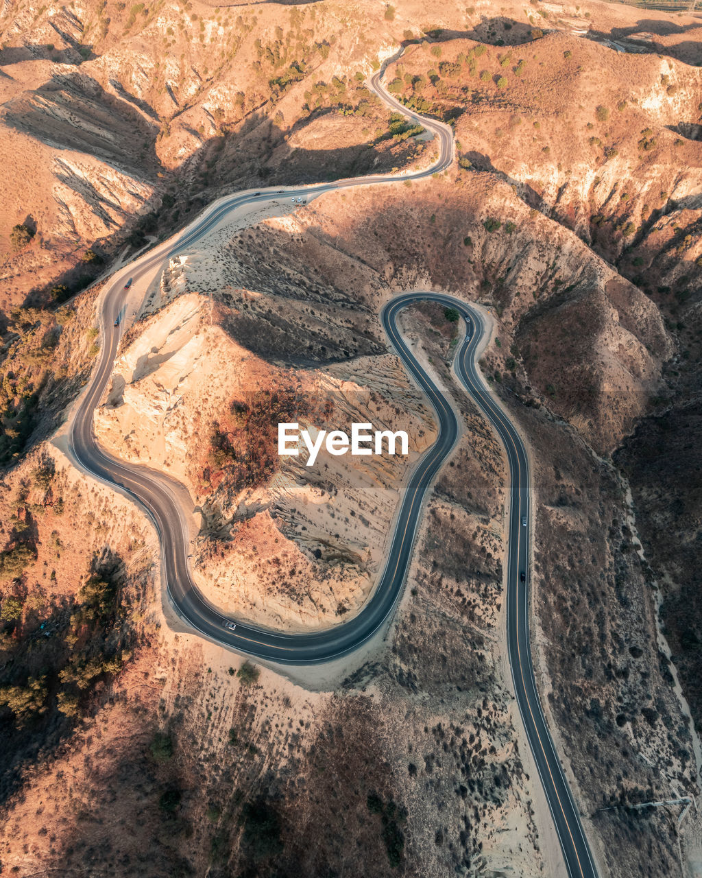 High angle view of road passing through landscape taken with a drone in grimes canyon in california 