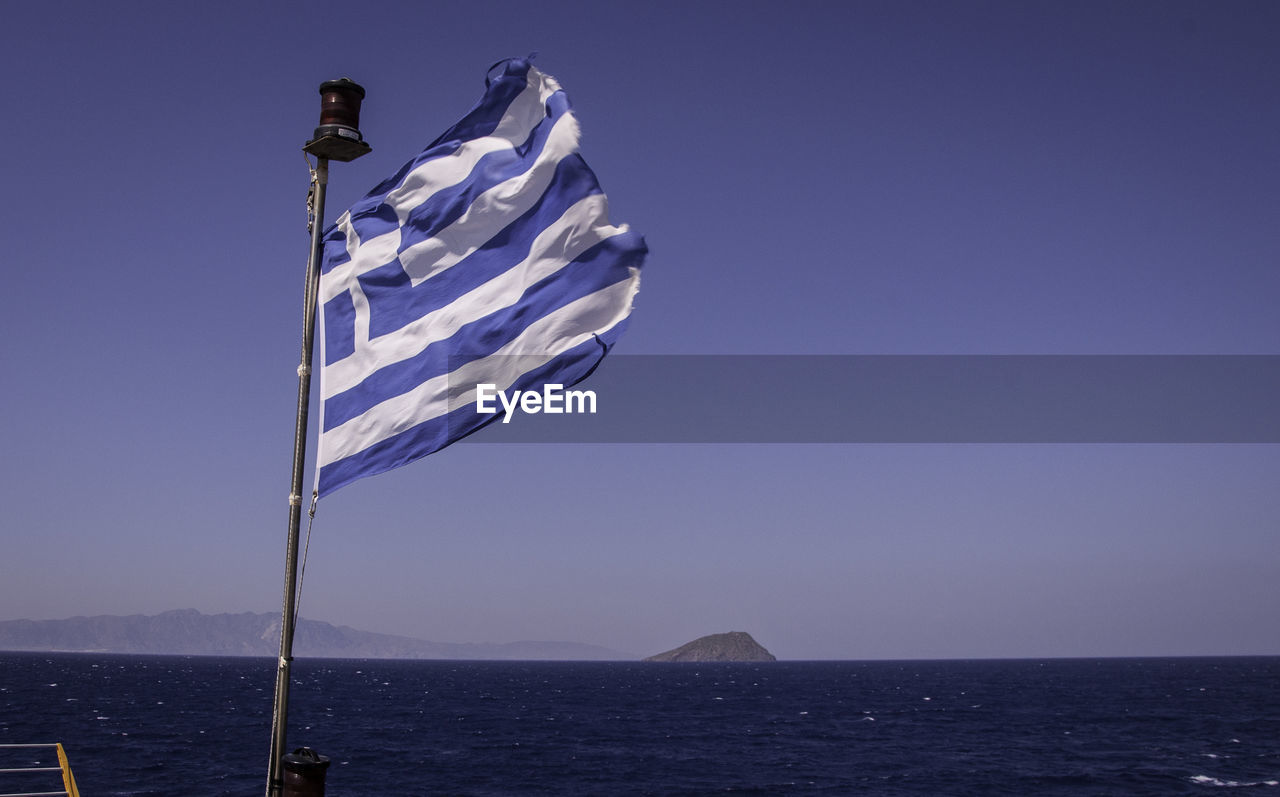 Greek flag blowing in the wind