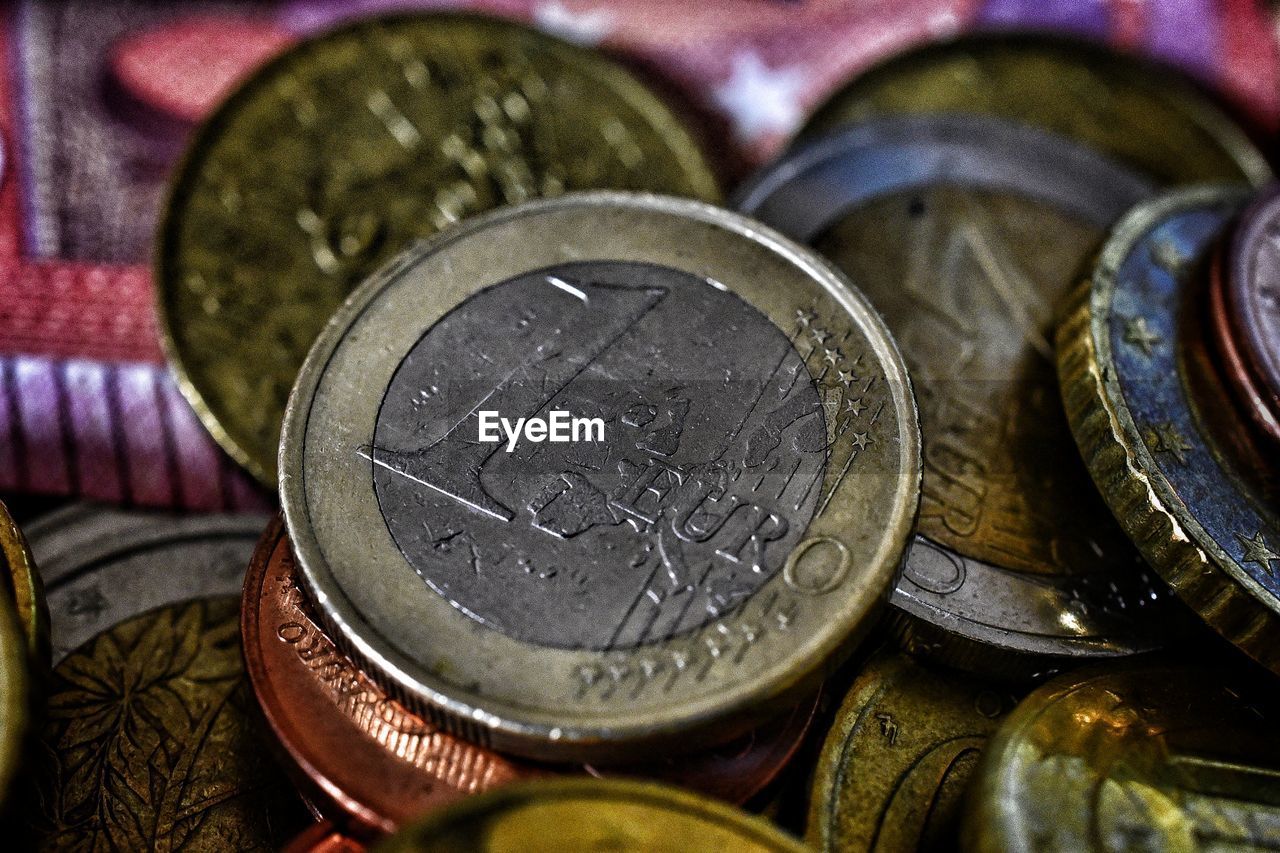 High angle view of coins