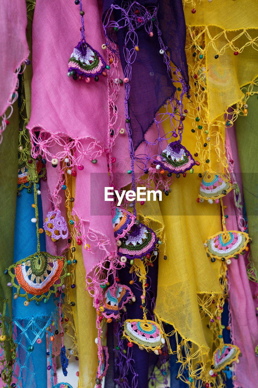 FULL FRAME SHOT OF MULTI COLORED DECORATION HANGING