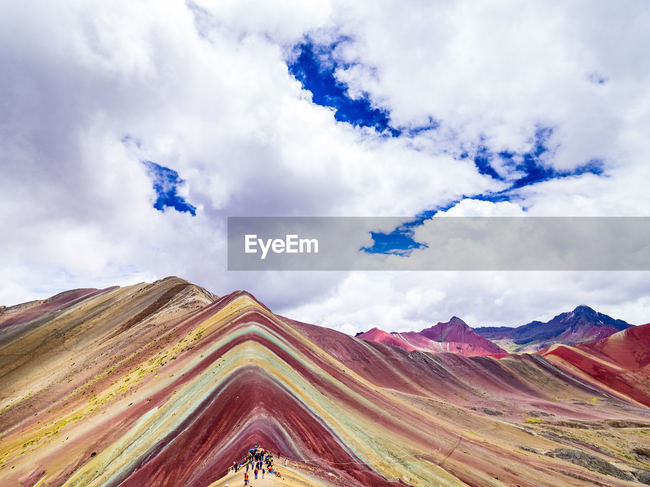 LOW ANGLE VIEW OF CLOUDY SKY OVER MOUNTAIN