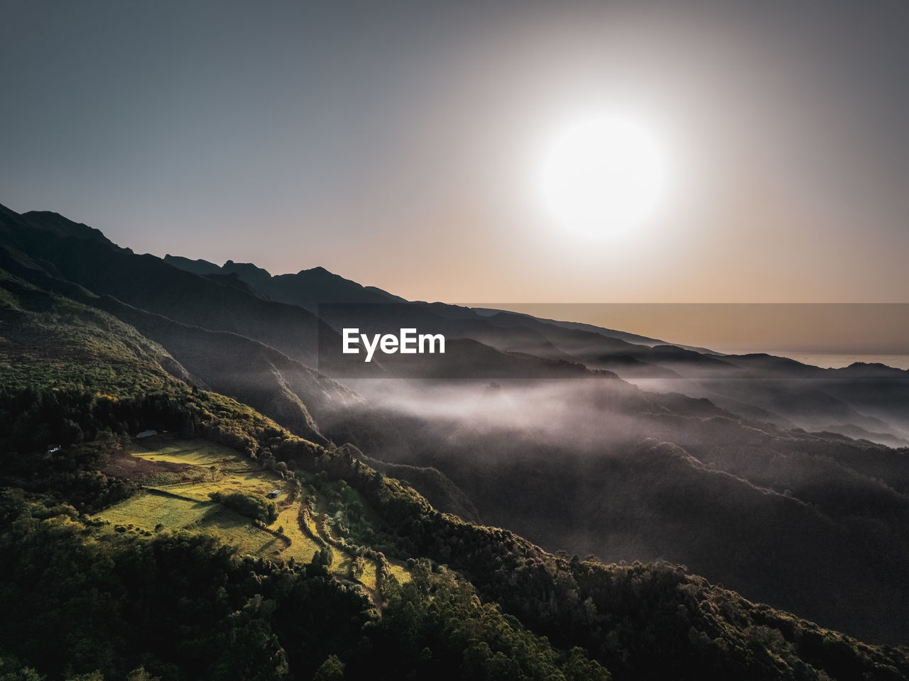 Scenic view of mountains against sky during sunset