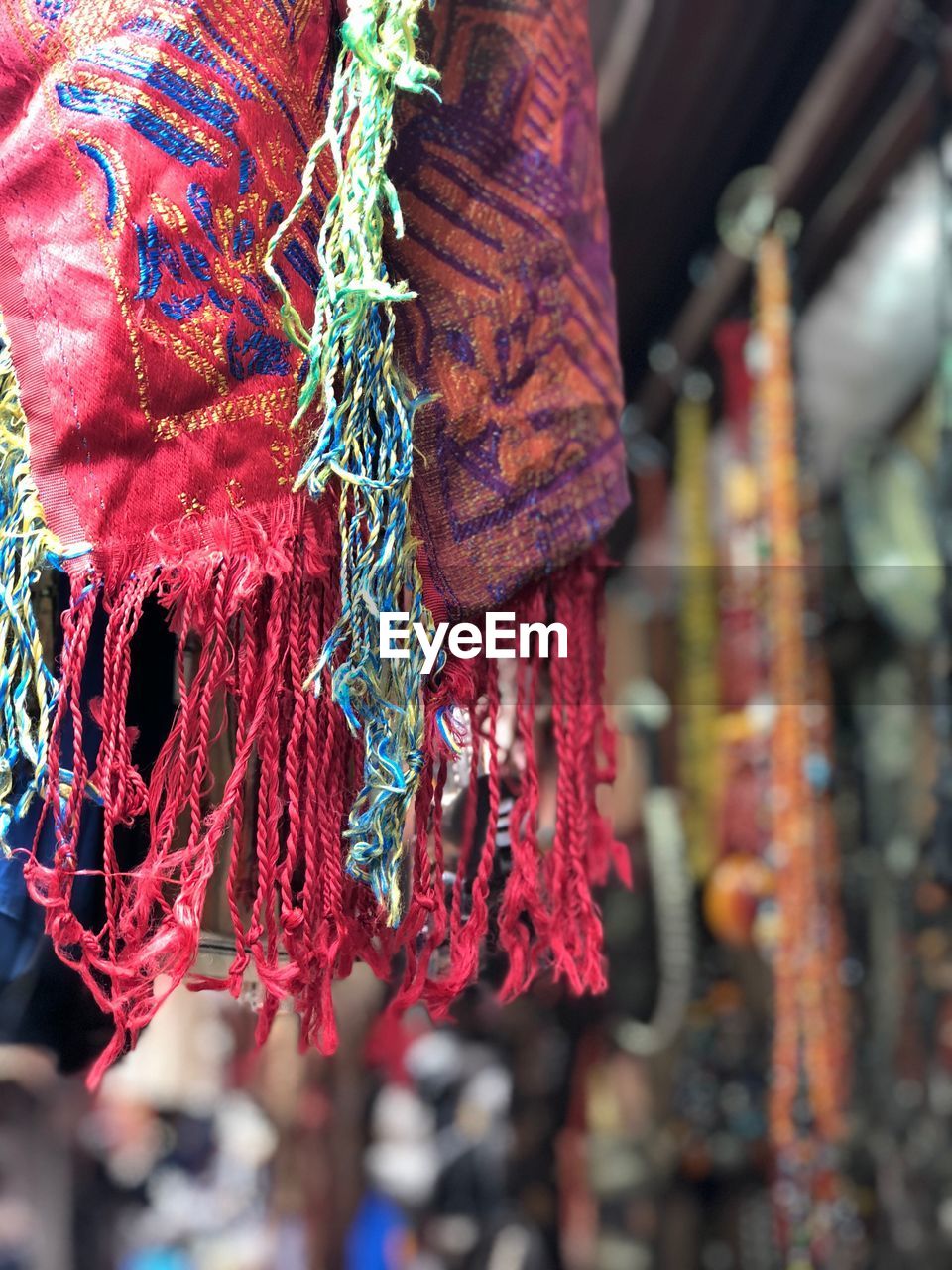 Close-up of multi colored decoration hanging at market stall