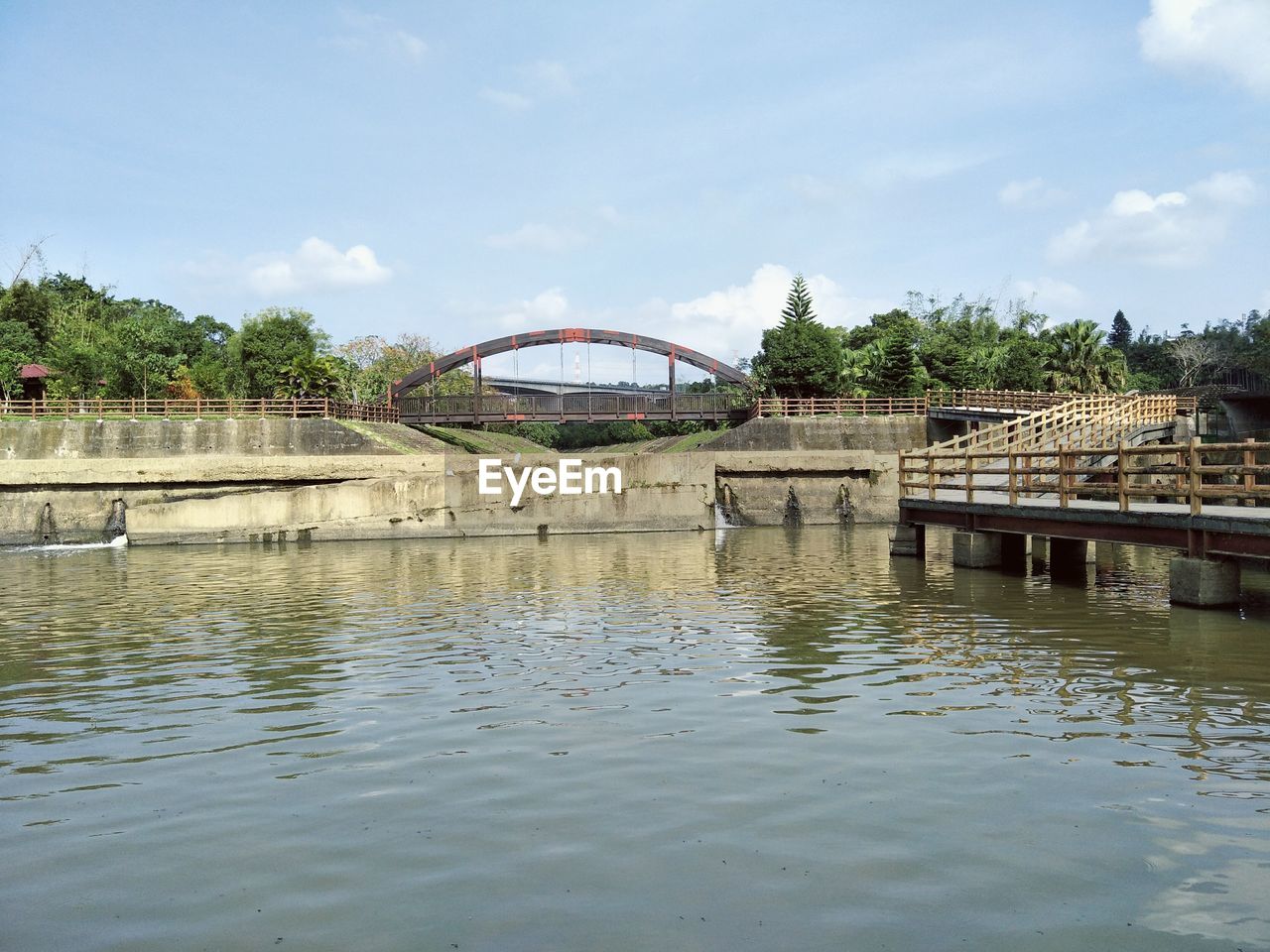 Bridge over river against sky