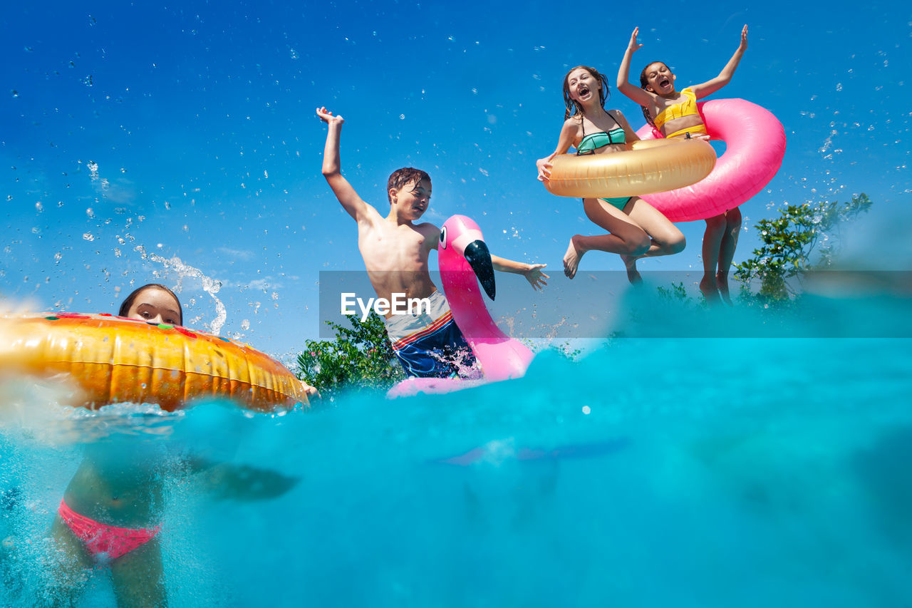 Group of people in swimming pool