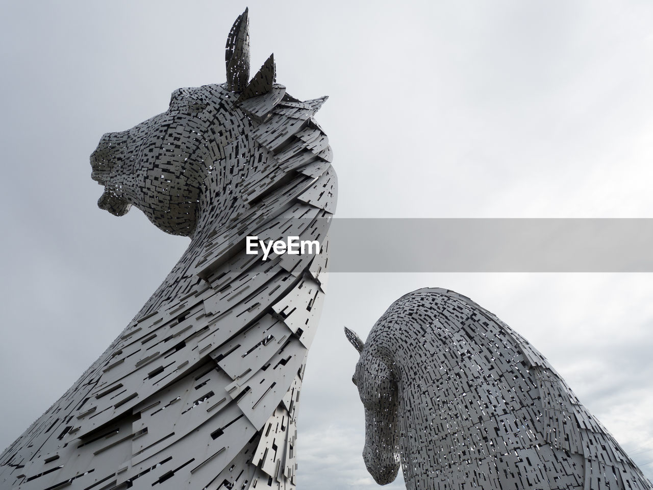 LOW ANGLE VIEW OF A STATUE OF TEMPLE