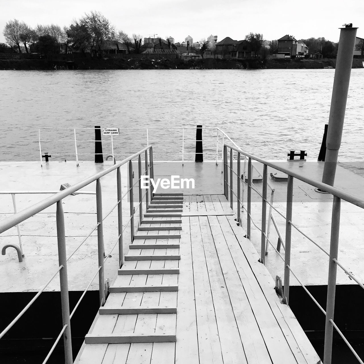 PIER ON LAKE BY FOOTPATH