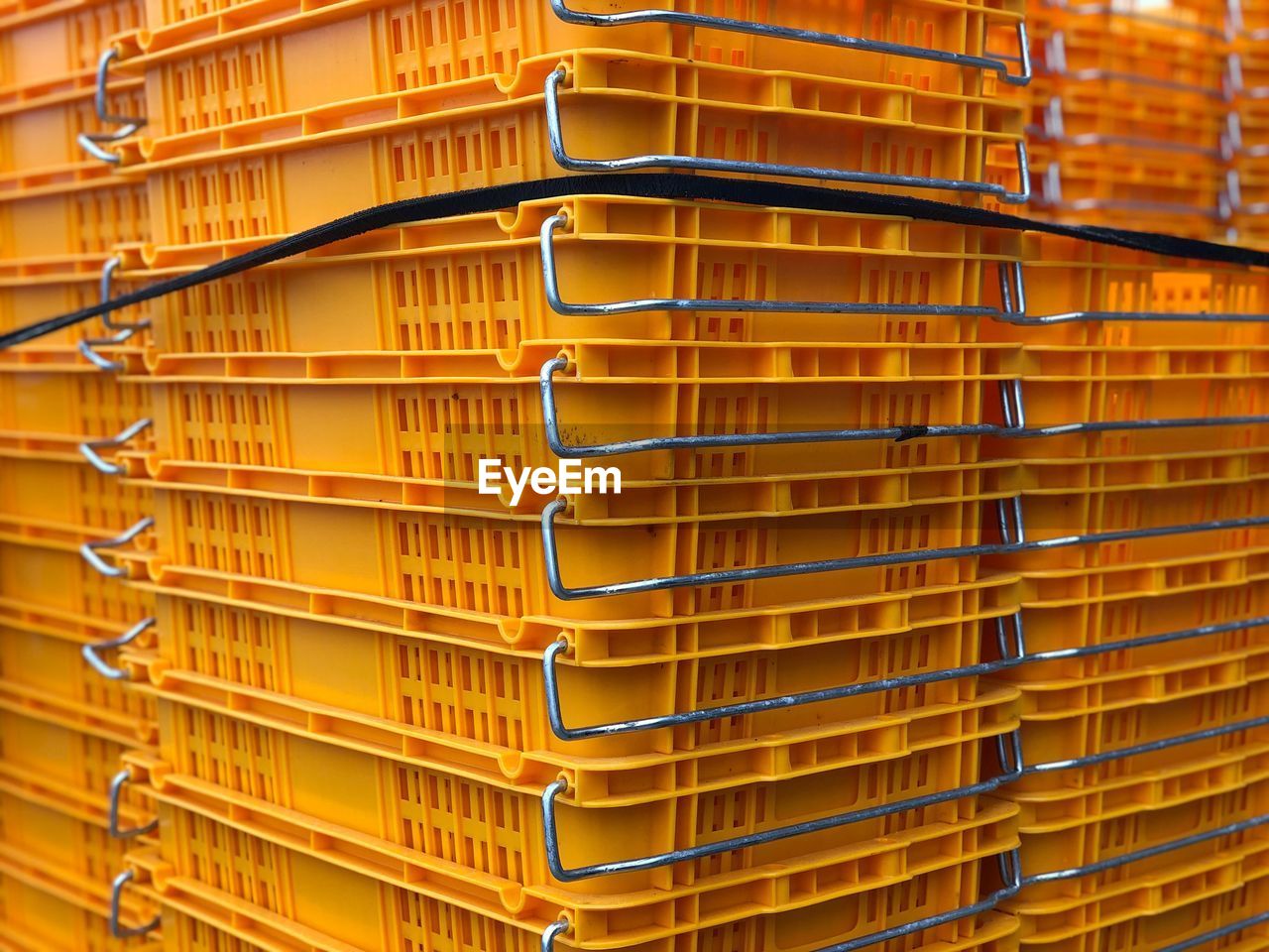 FULL FRAME SHOT OF YELLOW MACHINE IN ROW