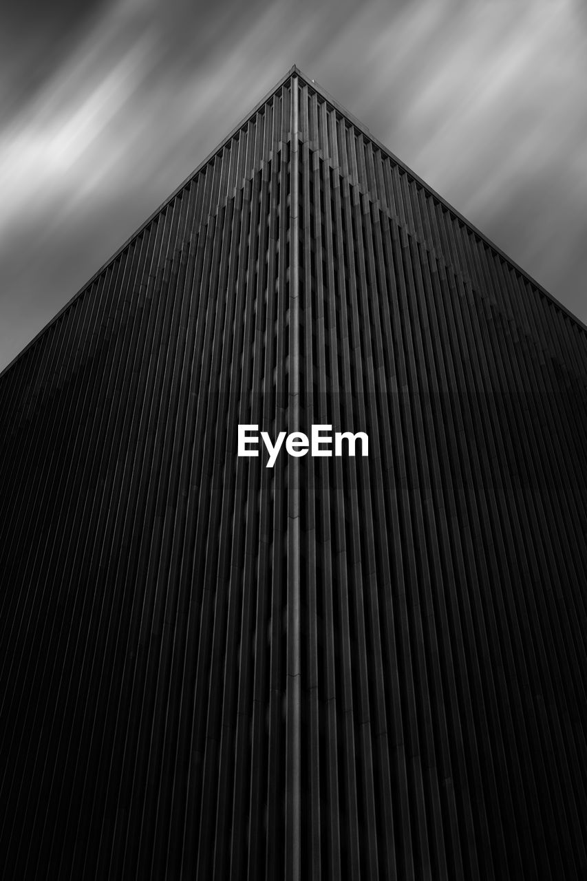 LOW ANGLE VIEW OF MODERN BUILDINGS AGAINST SKY