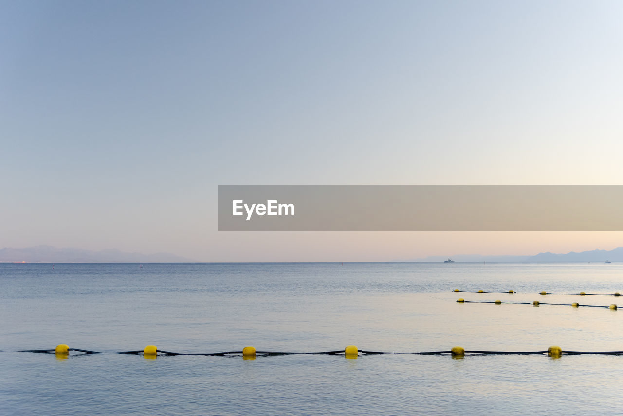 Sunset over the red sea with pink orange mountains on the background. eilat, aqaba, israel, jordan