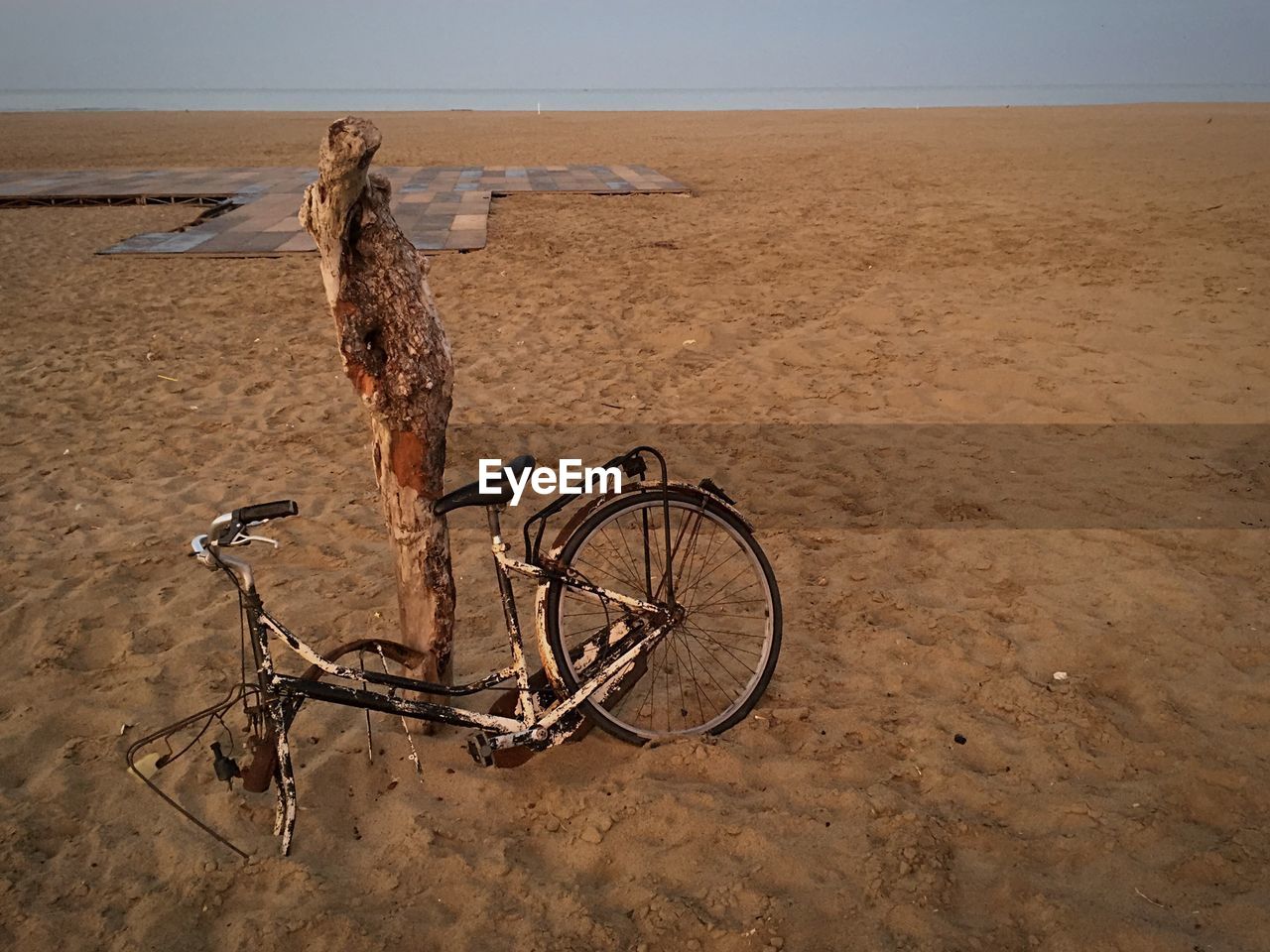 BICYCLE ON SAND AT BEACH