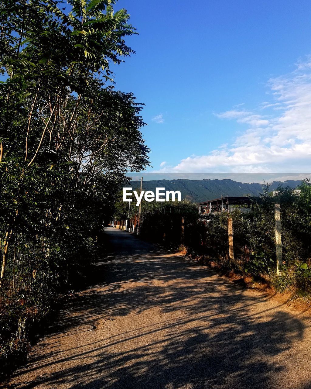 VIEW OF EMPTY ROAD AGAINST SKY