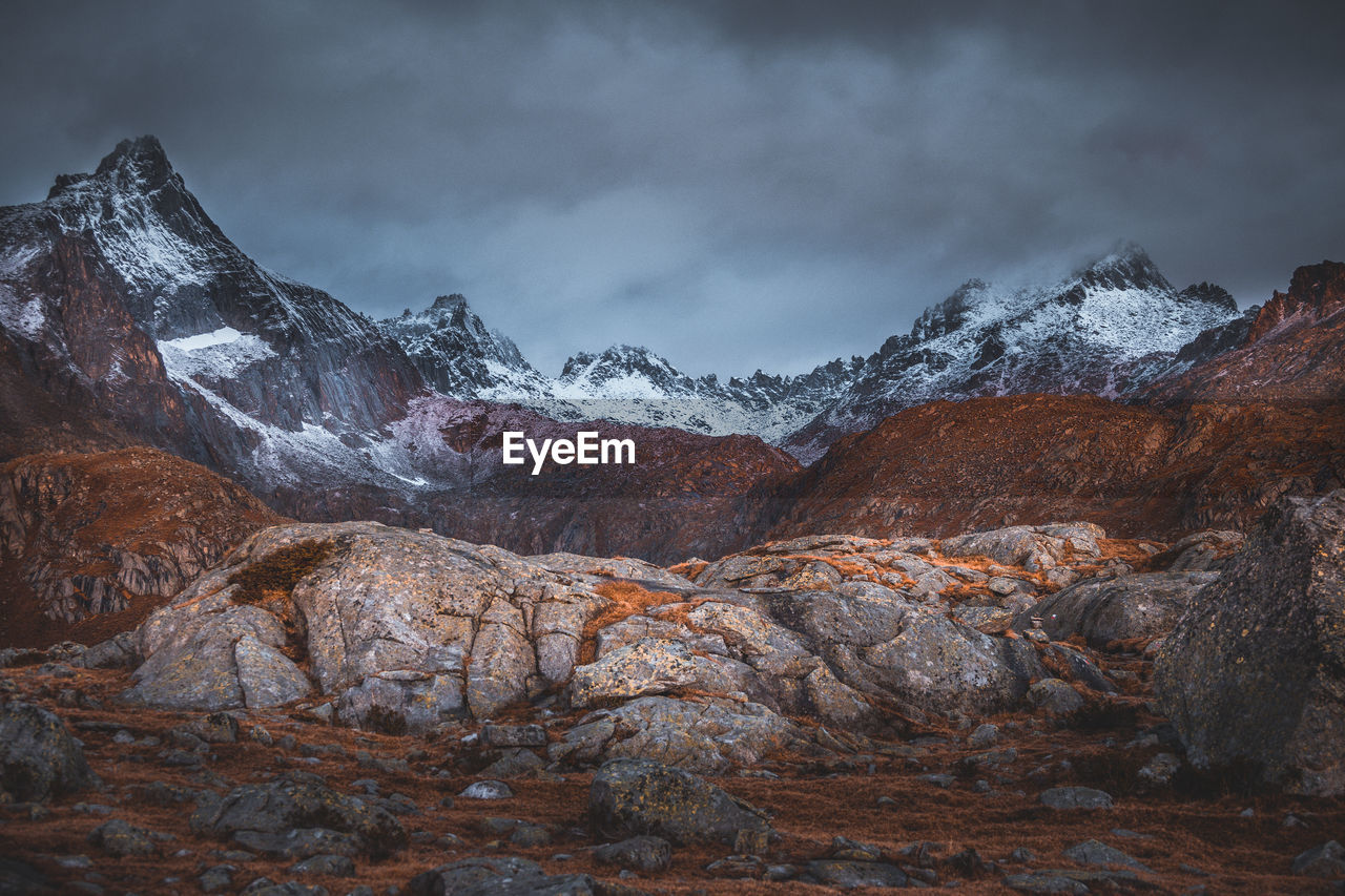 Scenic view of snowcapped mountains against sky