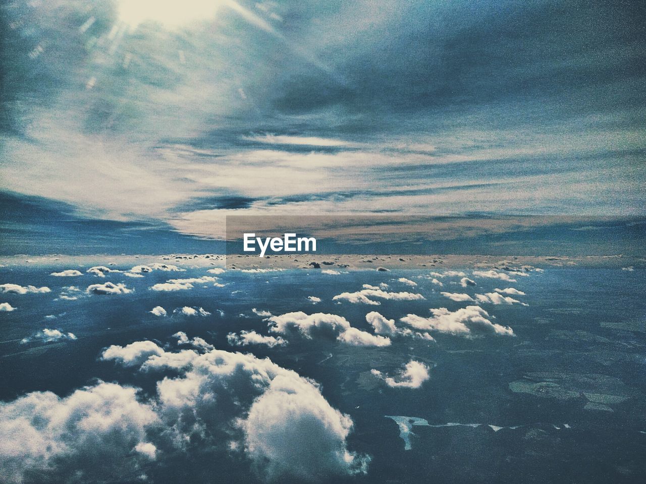 CLOSE-UP OF DRAMATIC SKY OVER CLOUDS