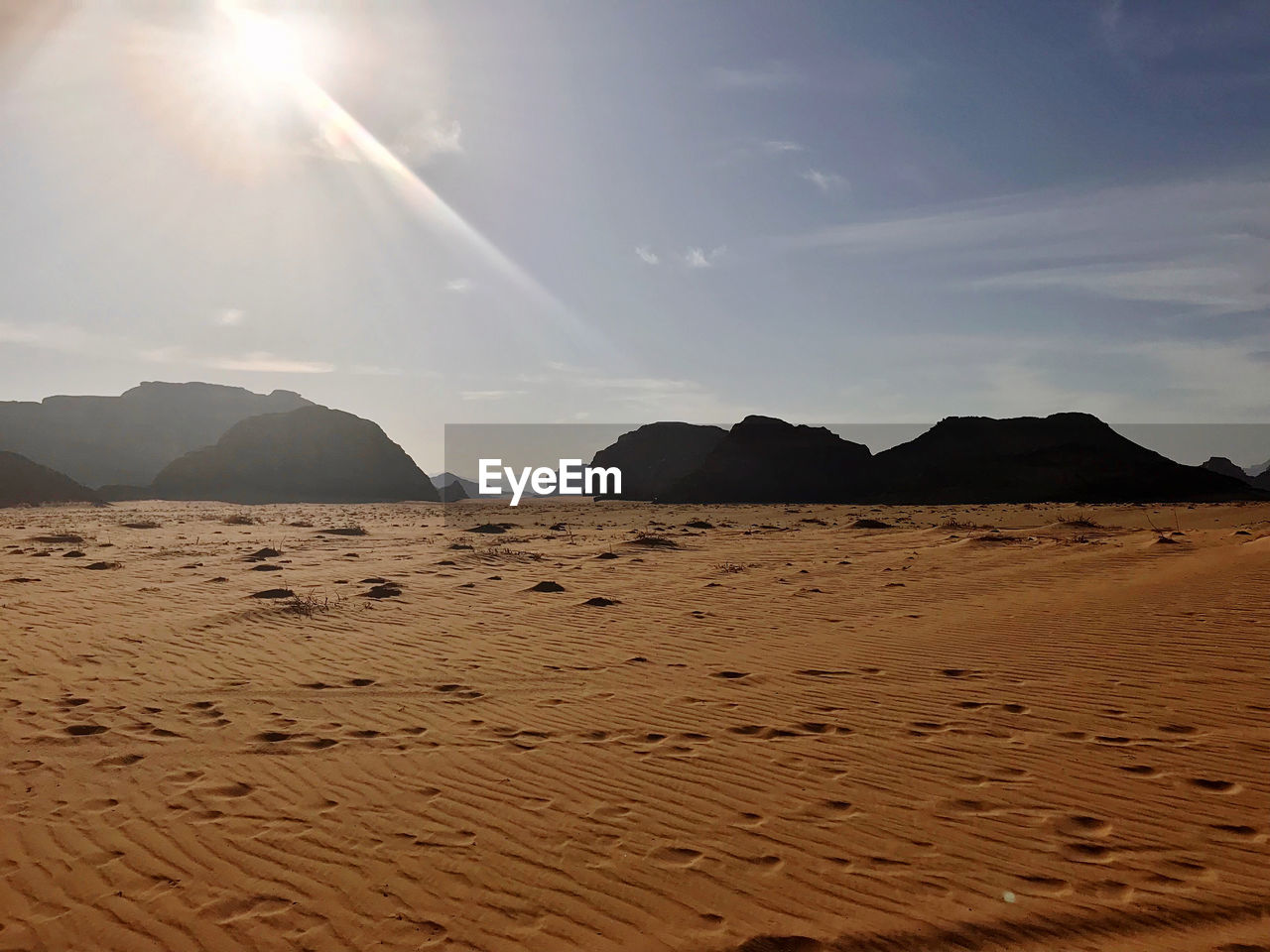 Scenic view of desert against sky