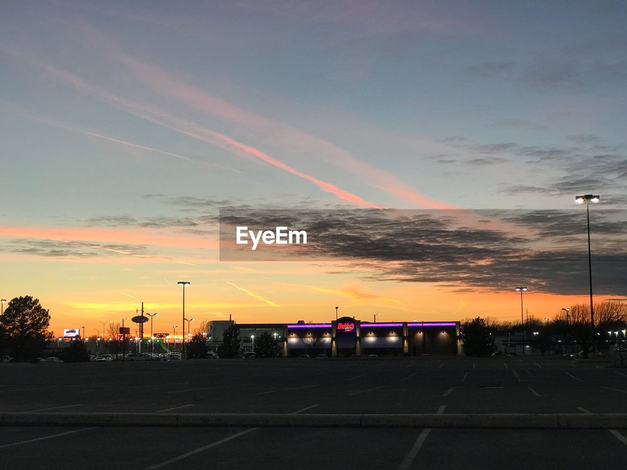 ROAD AGAINST SKY AT SUNSET