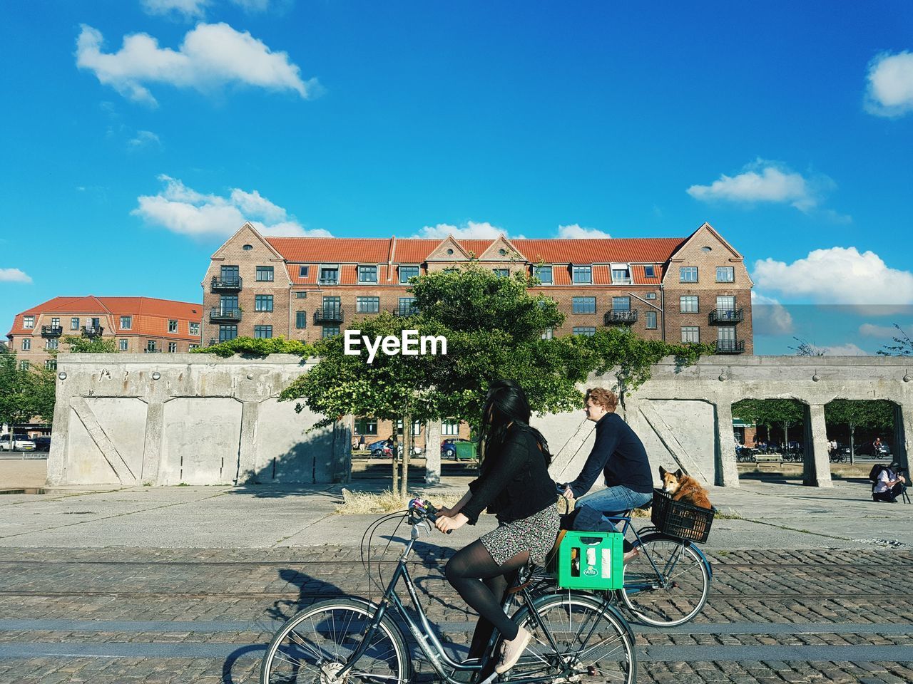 BICYCLE AGAINST BLUE SKY IN CITY