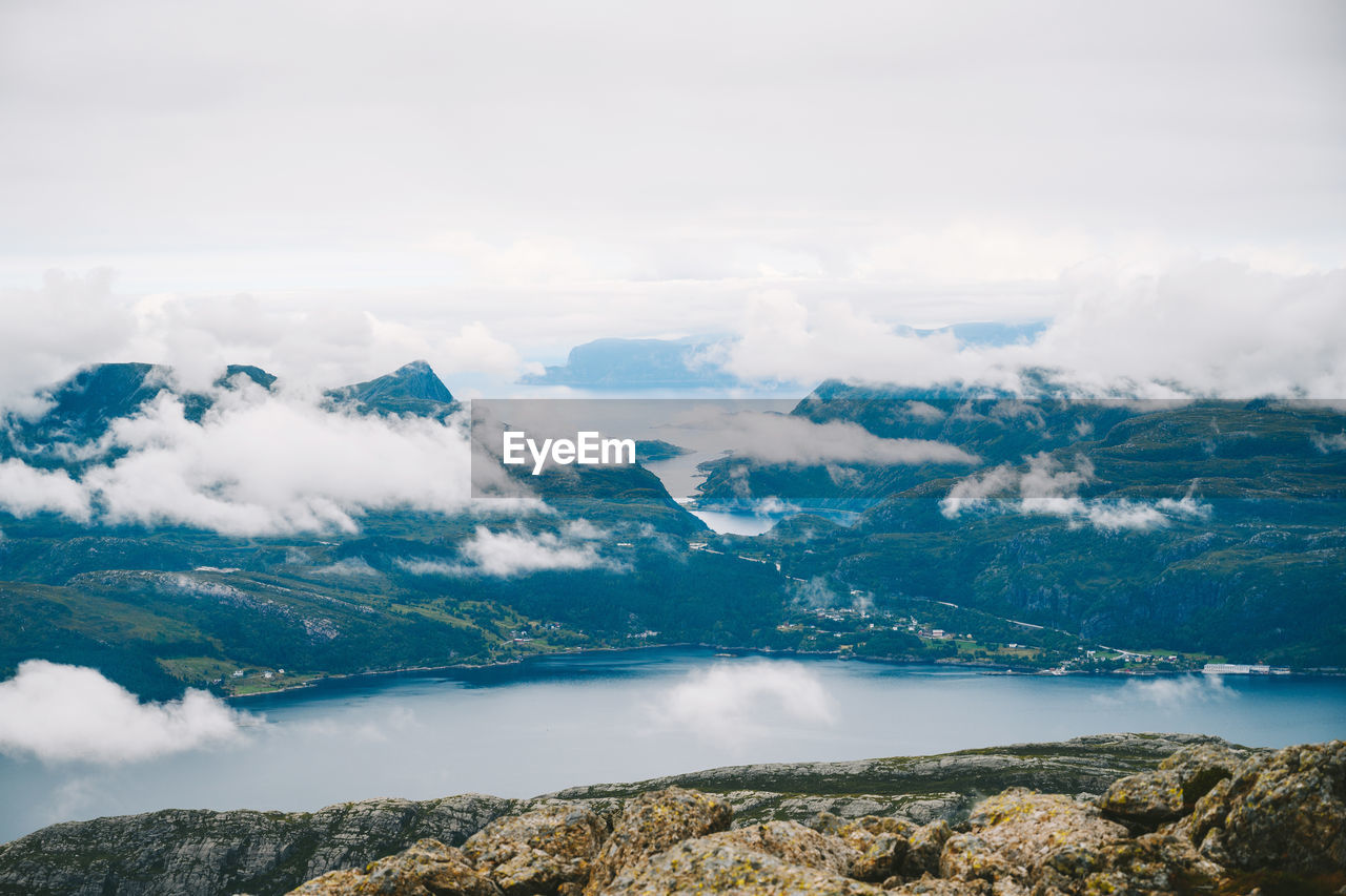 Aerial view of mountain by sea