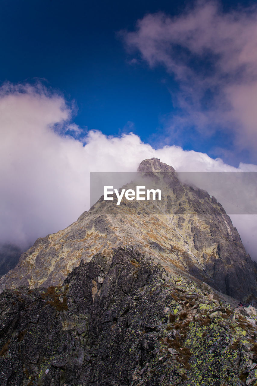 Low angle view of mountain against sky