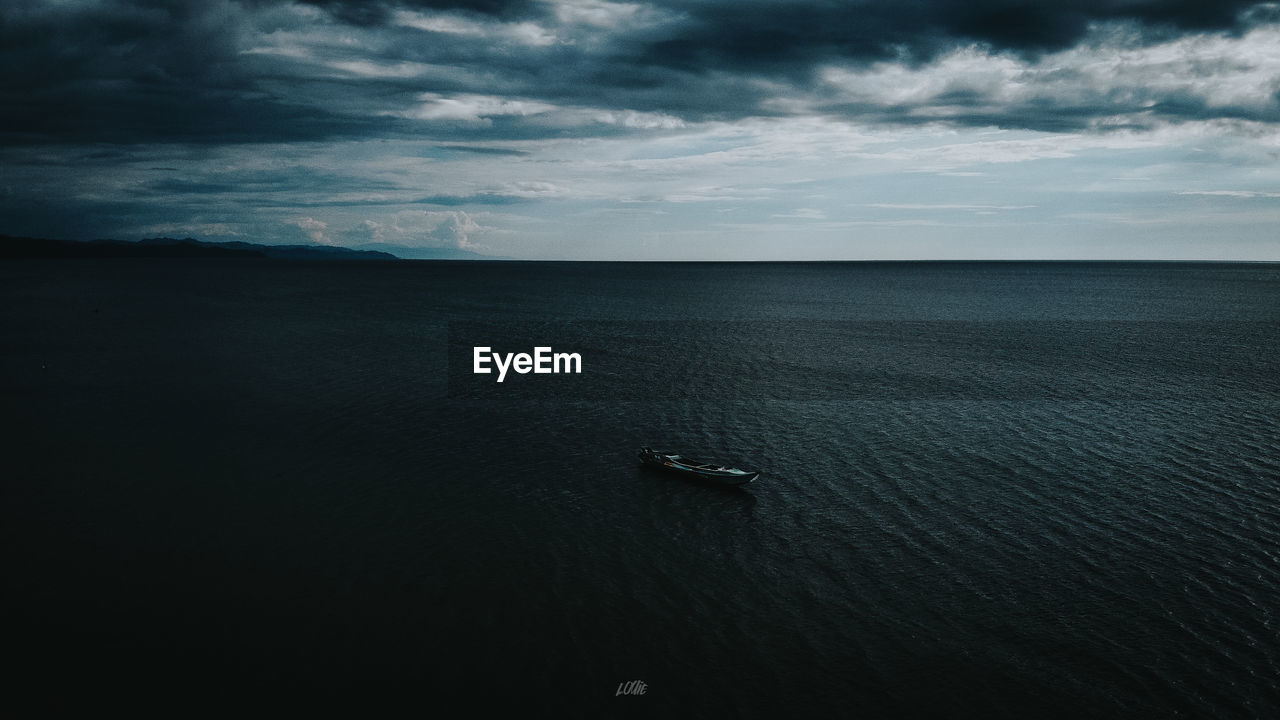 High angle view of sailboat in sea against sky