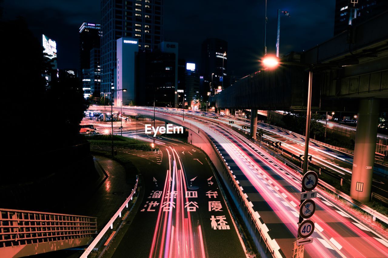 High angle view of light trails on city street