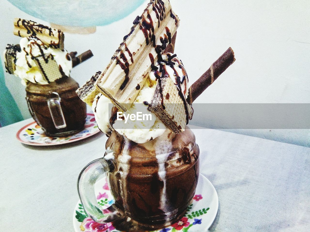 CLOSE-UP OF ICE CREAM IN TABLE