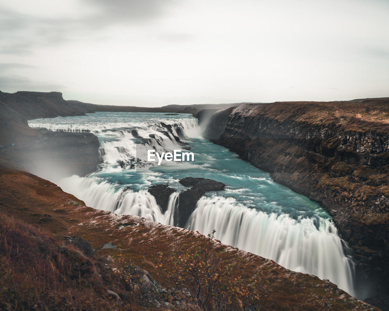 SCENIC VIEW OF WATERFALL