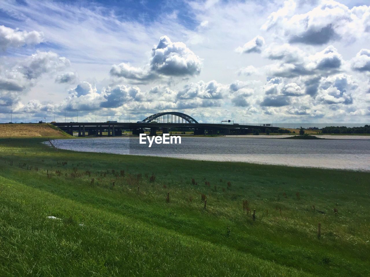 Bridge over river against sky